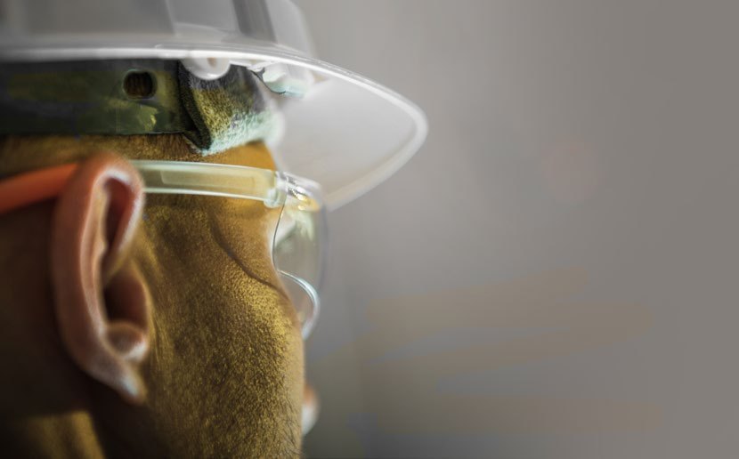 Engineer in a hard hat and safety glasses